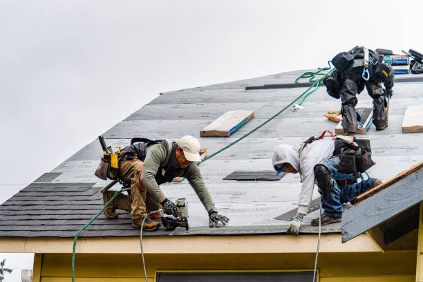 Professional Gutter Installation technician working in Merrimac, MA